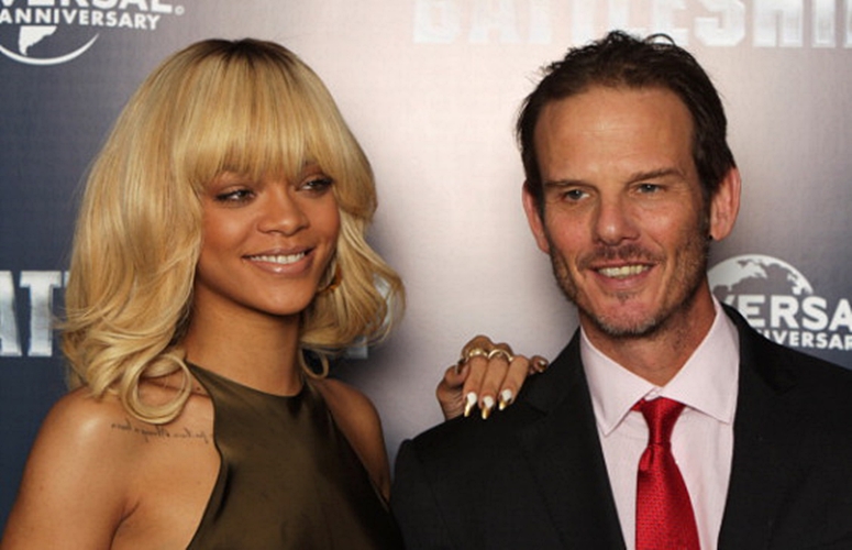 LONDON, ENGLAND - MARCH 28: Rihanna and Peter Berg attend a photocall for Battleship at The Corinthia Hotel on March 28, 2012 in London, England. (Photo by Dave J Hogan/Getty Images)