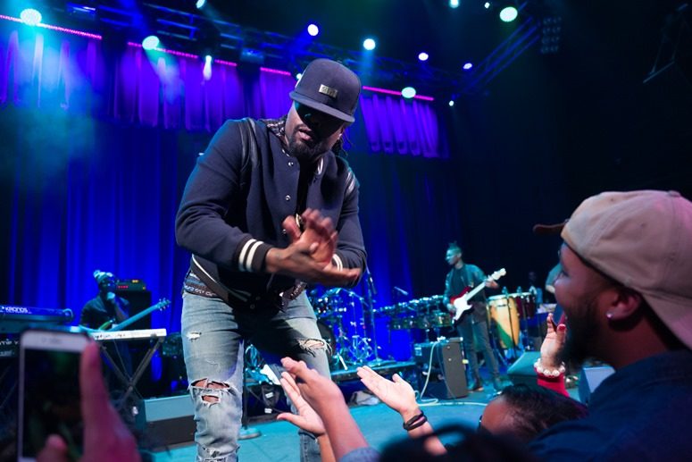 DC's own Maybach Music Recording Artist, Wale, surprises the guests at The 2016 Raheem Devaughn and Friends Benefit Holiday Concert. Photo Credit: Tony Mobley for The LoveLife Foundation