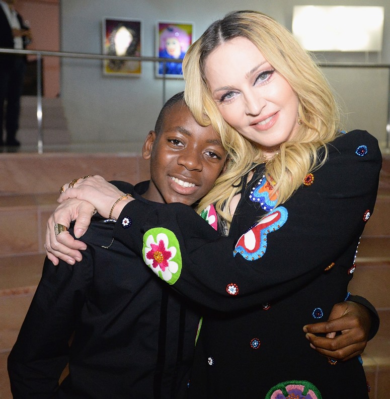 MIAMI BEACH, FL - DECEMBER 03: David Banda and Madonna at her Evening of Music, Art, Mischief and Performance to Benefit Raising Malawi at Faena Forum on December 3, 2016 in Miami Beach, Florida. (Photo by Kevin Mazur/Getty Images for Bulgari)