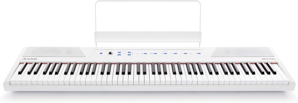 Alesis Recital – 88 Key Digital Piano Keyboard with Semi Weighted Keys, 2x20W Speakers, 5 Voices, Split, Layer and Lesson Mode, FX and Piano Lessons