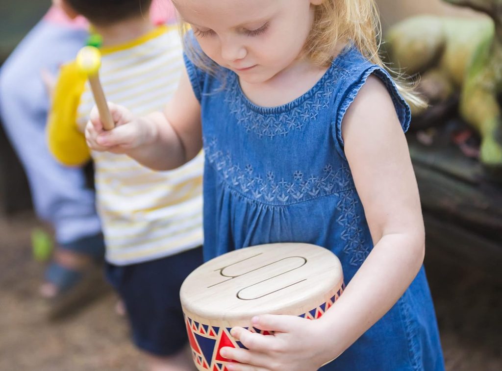 PlanToys Solid Drum Toddler Musical Instrument - Sustainably Made from Rubberwood Featuring Organic-Pigment Coloring and Water-Based Dyes Featuring Drumstick with Rubber Head