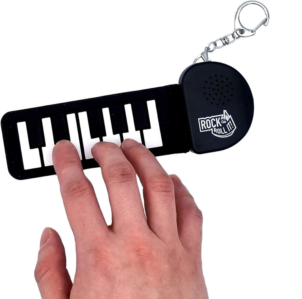 Rock And Roll It - Micro Piano. Real Working  Playable Piano Keychain. Hang on a Backpack  Play Anywhere! Mini Size Black/White Finger Piano Pad. Tiny Silicone Electronic Keyboard. Battery Included